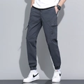 Men's dark charcoal cotton cargo jogger pants with large side pockets and drawstring waist - 660 Gray / 29