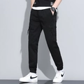 Men's black cotton cargo joggers with drawstring waist and classic side flap pockets - 660 Black / 29