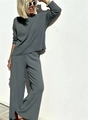 Detail of grey-blue knitted two-piece set featuring long-sleeve sweater and wide-leg pants - S / Gray