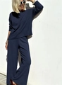 Navy blue two-piece knit set featuring a loose round neck sweater and high waist wide leg pants - S / Navy Blue