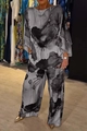Detail of elegant two-piece satin set featuring black and white artistic ink floral prints - Gray