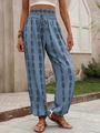 Detail of high waisted bohemian jogger pants with blue ethnic floral geometric print - S / Blue