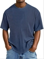 Detailed view of dark blue men's T-shirt featuring vertical micro-pleated texture fabric - Navy Blue