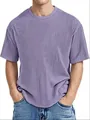 Close-up of lilac men's T-shirt showing waffle knit texture and classic crew neck detail - Purple