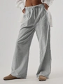 Dettaglio della vita elastica con coulisse e texture a righe verdi dei pantaloni larghi - S / Grigio