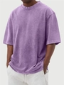 Detail of men's vintage acid wash purple t-shirt with heavy cotton fabric and dropped shoulders - Purple