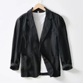 Close-up of black cotton linen blazer featuring natural texture and single-button detail - S / Black
