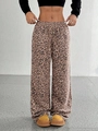Dettaglio dei pantaloni leopardati a gamba larga con coulisse regolabile in vita - S / Rosa