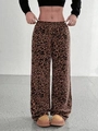 Dettaglio dei pantaloni larghi leopardati con vita elastica e coulisse regolabile - S / Castano