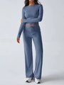 Detail of grey-blue long sleeve crop top and high-waisted wide-leg yoga pants set - Denim Blue