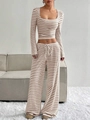 Detail of soft ribbed knit striped crop top and high waist wide leg trousers on a model - S / Khaki