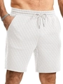 Close-up of men's white shorts with quilted diamond pattern and drawstring waist - S / White