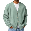 Detail of sage green waffle knit texture and wooden buttons on men's V-neck cardigan - Green