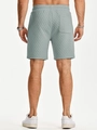 Detail view of quilted mint green casual shorts showing elastic waistband and back pocket - S / Light Green