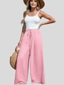 Dettaglio dei pantaloni a gamba larga in cotone e lino a vita alta con coulisse rosa chiaro - S / Rosa