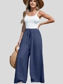 Dettaglio dei pantaloni larghi in lino con coulisse ed elastico in vita in blu scuro - S / Blu Notte