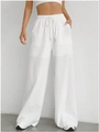 Detail of white wide-leg trousers featuring elastic drawstring waist and large pockets - S / White