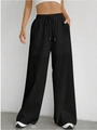 Detailed macro view of the elastic waistband with adjustable drawstring and fabric texture - S / Black
