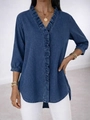 Detailed view of the V-neck with ruffled trim and denim texture on the women's blouse - S / Navy Blue