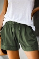 Close-up of olive green casual shorts featuring an adjustable elastic drawstring waistband - 3XL / Bottoms / Army Green