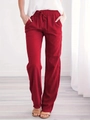 Detail of red cotton linen wide-leg pants with elastic drawstring waistband and textured fabric - Red
