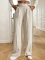 High-waist wide-leg pants in cream with adjustable buckle and front crease detail - S / Apricot