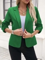 Detailed close-up of a vibrant green women's blazer with ruched sleeves and notched lapel - S / Tops / Green