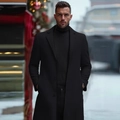 Classic black wool overcoat for men with notch lapels in elegant winter street setting - XS / Black