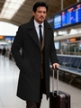 Classic black double-breasted wool trench coat for men shown in a business travel airport setting - S (US Size) / Black