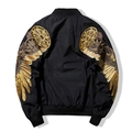 Black bomber jacket featuring intricate gold wing embroidery on the back and sleeves - S / Black