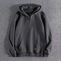 Men's dark grey half-zip hoodie with kangaroo pocket and square leather logo detail - Gray