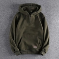 Men's olive green half-zip hoodie with premium leather patch and kangaroo pocket - Green