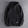 Men's black half-zip hoodie with heavy cotton texture and decorative patch detail - Black