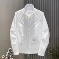 Detail of white men's jacket featuring a stand collar zipper and metal D-ring accent - M / White