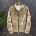 Detail of khaki windbreaker jacket with standing collar and original element patch - M / Khaki