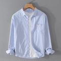 Camicia da uomo a righe azzurre in cotone con taschino sul petto ed etichetta - M / Azzurro