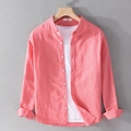 Men's coral pink linen long sleeve shirt displayed on hanger with layered white t-shirt - S / Watermelon red