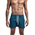 Herren-Sportshorts in Tiefblau, schnelltrocknend mit elastischem Bund und Kordelzug - M / Smaragdblau