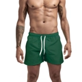 Herren Badeshorts in Dunkelgrün, schnelltrocknend mit Kordelzug für Strand und Pool - M / Grün