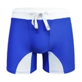 Détail du short de bain bleu avec taille élastique blanche et cordon de serrage réglable - M / Bleu