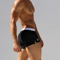 Maillot de bain homme noir taille basse avec ceinture blanche et fente sur le côté - M / Noir