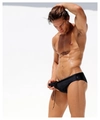 Detail of men's black swim briefs featuring adjustable waist drawstring and metal eyelets - M / Black