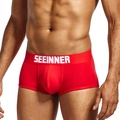 Solid red men's cotton boxer briefs with white elastic branded waistband on a male model - M / Red
