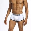 Détail du boxer en coton pour homme avec liseré contrasté noir et ceinture élastique logo - S / Blanc