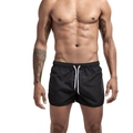Détail du short de bain noir pour homme avec taille élastique à cordon et fente latérale - S / Bas / Noir