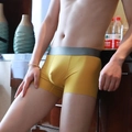 Detail view of yellow ice silk men's boxer briefs with elastic gray waistband fit - M / Yellow