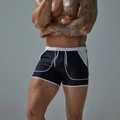 Men's black swim trunks with white drawstring and pocket contrast detailing - M / Black