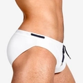 Detail of white men's swim briefs showing quick-dry fabric and navy blue drawstring - White