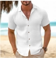 Close-up of white linen beach shirt featuring natural wooden buttons and breathable texture - S / White