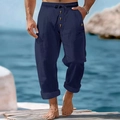 Detail of navy blue cotton linen trousers showing drawstring waist and decorative buttons - Navy Blue